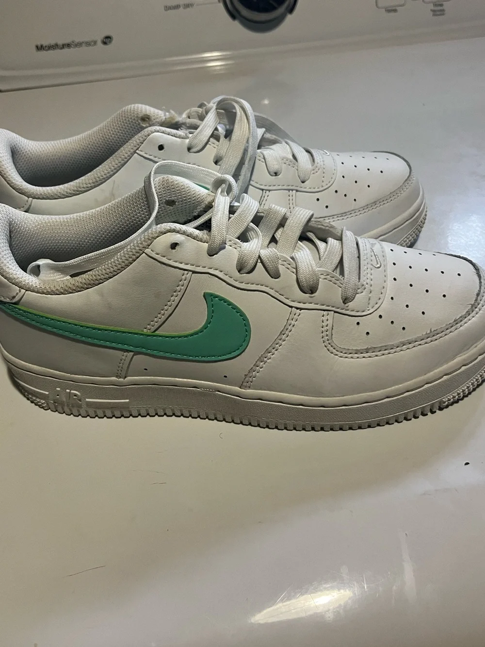 Nike White Sneakers with Light Green Swoosh Accent
